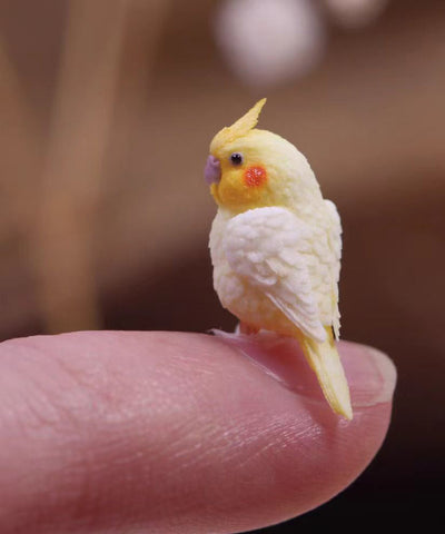 Lindos pendientes colgantes de loro en plata de ley dorada 