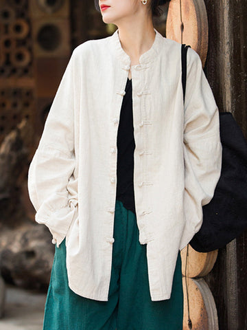 Blusas plisadas de color liso con cuello alto, mangas murciélago y botones de rana chinos sueltos. 