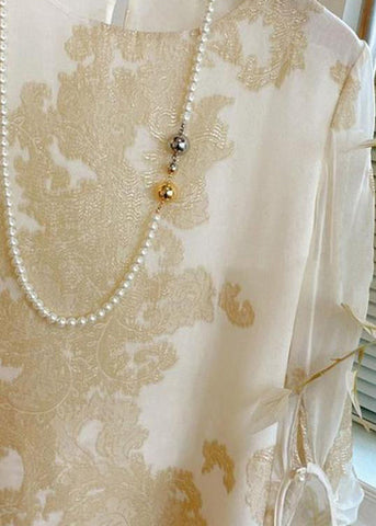 Art Apricot O-Ausschnitt Jacquard Patchwork Seidenblusen Laternenärmel