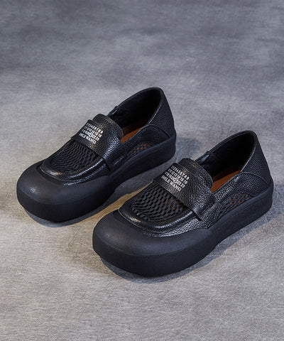 Mocasines casuales de piel de vaca negra con agujeros para mujer 