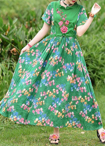 Vestido de verano francés de algodón con estampado verde y lazo en la cintura bordado. 