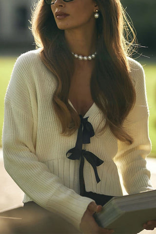Suéter elegante con cuello en V y lazo en la parte delantera de Meridress