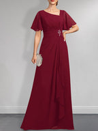 A-Linien-Kleid aus Chiffon in Bodenlänge mit asymmetrischem Schnitt, plissiert und mit Pailletten und Perlenstickerei