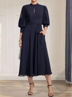 A-Linien-Kleid aus Chiffon mit hohem Kragen, Teelänge und Spitze für die Mutter der Braut, verziert mit einer Schleife