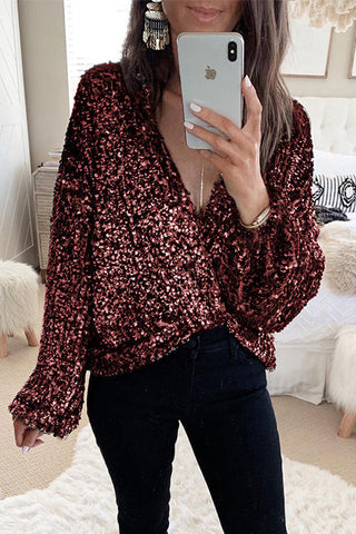 Top cruzado con lentejuelas y escote en V profundo de Meridress