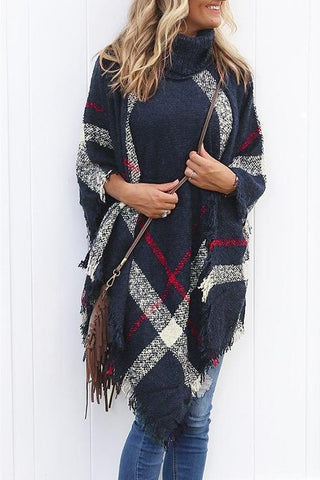 Suéter poncho con borlas y entramado más chic de Meridress
