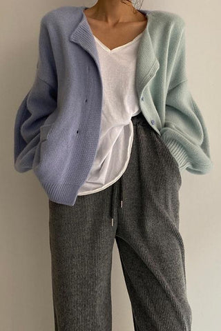 Suéter tipo cárdigan con hombros caídos y bloques de color de Meridress