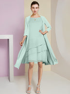 Vestidos de madre de la novia de corte A/princesa con escote joya y largo hasta la rodilla 