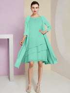 Vestidos de madre de la novia de corte A/princesa con escote joya y largo hasta la rodilla 
