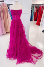 Vestido formal largo con volantes, sin tirantes y mangas abullonadas