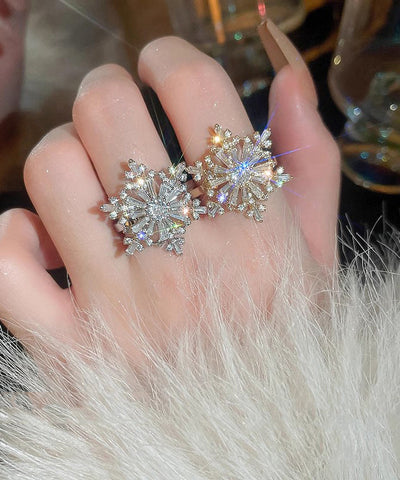 Anillos giratorios de copo de nieve de circón de cobre y seda con diseño original 