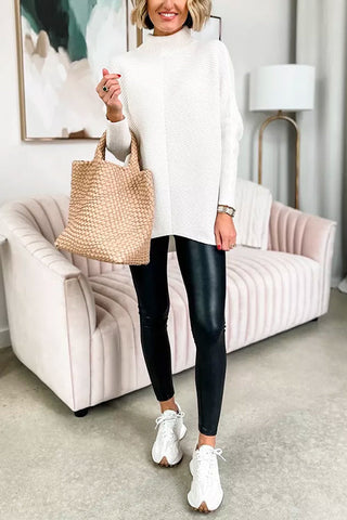 Suéter túnica de punto acanalado con cuello alto liso de Meridress