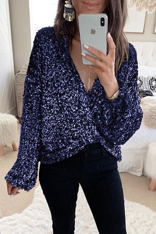 Top cruzado con lentejuelas y escote en V profundo de Meridress