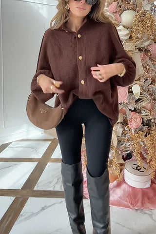 Cárdigan tipo suéter con mangas abullonadas y botones de Meridress