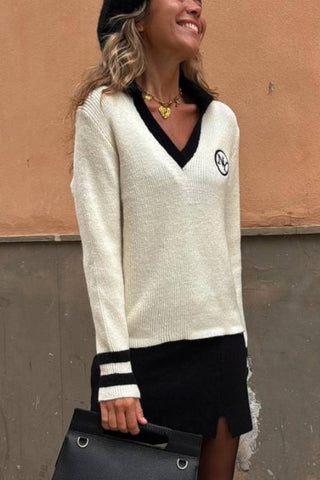 Suéter de moda con cuello en V beige de Quebec 
