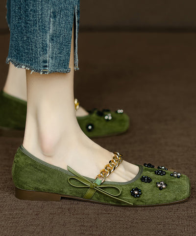 Zapatos planos con lazo y cuentas para mujer de ante negro 