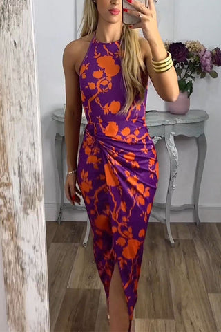 Vestido largo Meridress con cuello halter, abertura frontal torcida y estampado floral