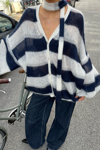 Suéter Meridress con mangas farol, botones, rayas en bloques de color y bufanda