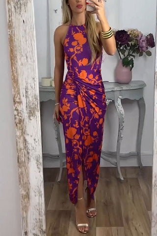 Vestido largo Meridress con cuello halter, abertura frontal torcida y estampado floral