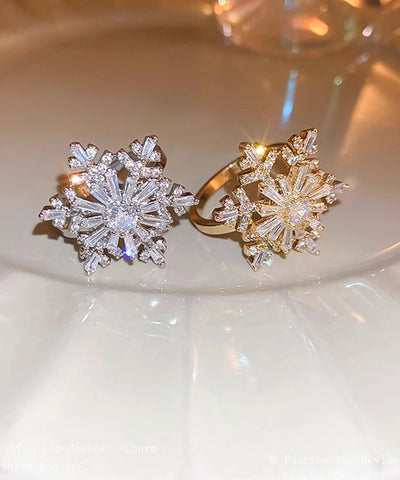 Anillos giratorios de copo de nieve de circón de cobre y seda con diseño original 