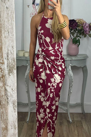 Vestido largo Meridress con cuello halter, abertura frontal torcida y estampado floral
