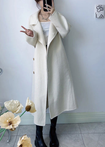 Abrigos de lana blancos de moda con cuello alto y lazo en la cintura para invierno 
