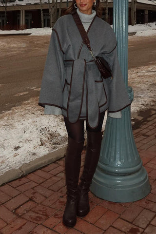 Abrigo de empalme con bolsillos delanteros abiertos y cinturón