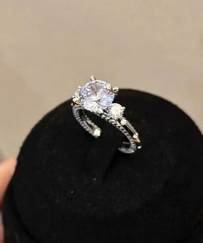 Anillos de cobre y circonitas moradas 