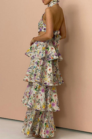 Elegante vestido floral sin espalda con lazo y cuello halter 