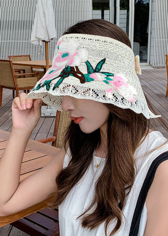 Sombrero flexible para el sol de algodón tejido con bordado floral color caqui 