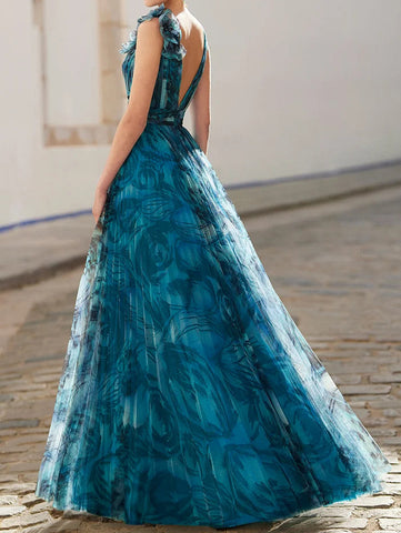 Vestido largo con estampado floral estéreo en azul pavo real 