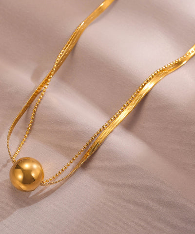 Collar con colgante de bola de acero inoxidable dorado para mujer 