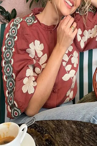 Blusas casuales con cuello redondo y botones con estampado floral 