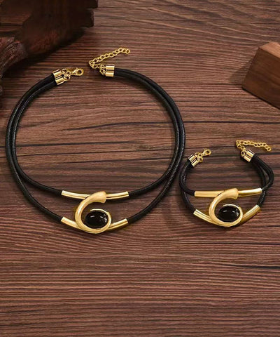 Conjunto de dos piezas de collar y pulsera con gemas acrílicas doradas y bohemias 