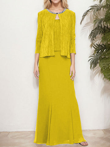 Vestido de dos piezas con efecto metalizado y chaqueta