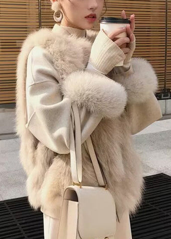 Elegante chaleco de piel y piel color albaricoque, sin mangas, con cuello redondo y cremallera 