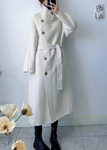 Abrigos de lana blancos de moda con cuello alto y lazo en la cintura para invierno 