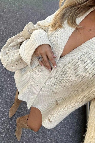 Suéter holgado liso con cuello en V y botones de Meridress