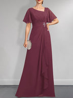 A-Linien-Kleid aus Chiffon in Bodenlänge mit asymmetrischem Schnitt, plissiert und mit Pailletten und Perlenstickerei