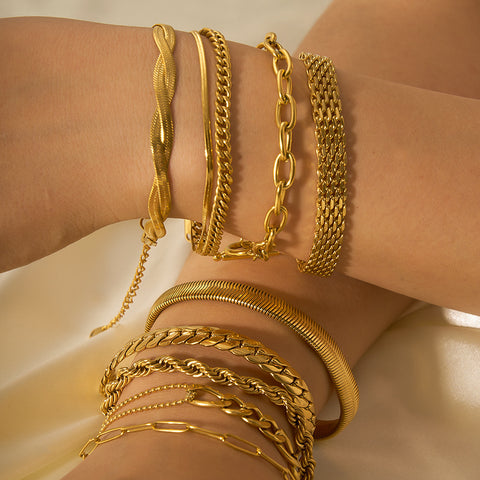 Pulseras de cadena de acero y titanio dorado con hueso de serpiente 