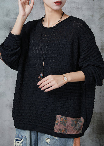 Suéter corto de punto con apliques negros de gran tamaño para primavera 