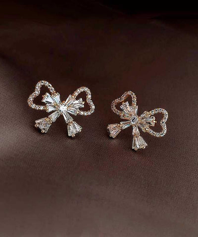 Pendientes de botón con lazo de circonita y aleación de plata esterlina y oro de moda 