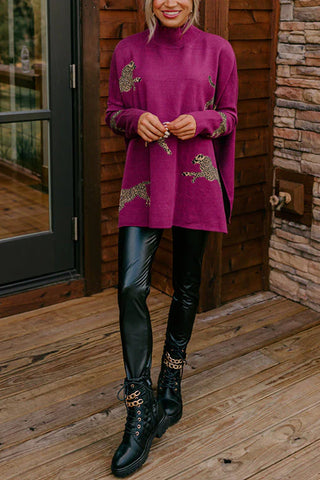 Suéter Meridress con cuello alto, abertura lateral y estampado de guepardo
