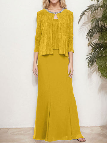 Vestido de dos piezas con efecto metalizado y chaqueta