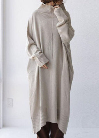 Vestido tipo suéter de punto extragrande con cuello alto beige de Boutique Primavera 