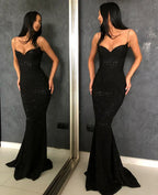 Schwarzes, langärmeliges Meerjungfrauen-Abendkleid mit Spaghettiträgern und Pailletten 