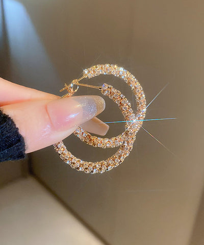 Pendientes de aro de cobre y oro con circonitas de moda 