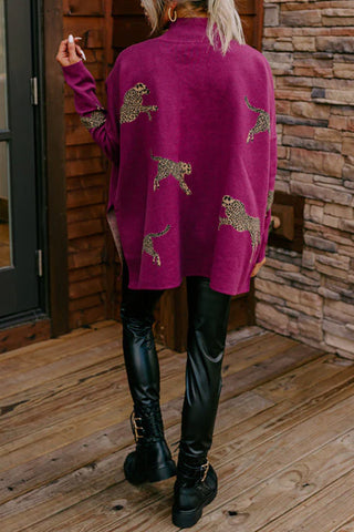 Suéter Meridress con cuello alto, abertura lateral y estampado de guepardo