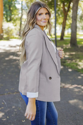 elegante blazer gris con cuello de solapa 
