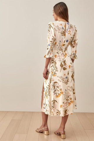 Vestido midi con abertura y manga corta con cuello redondo y estampado floral 